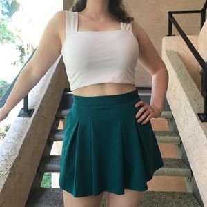 Green pleated tennis skirt